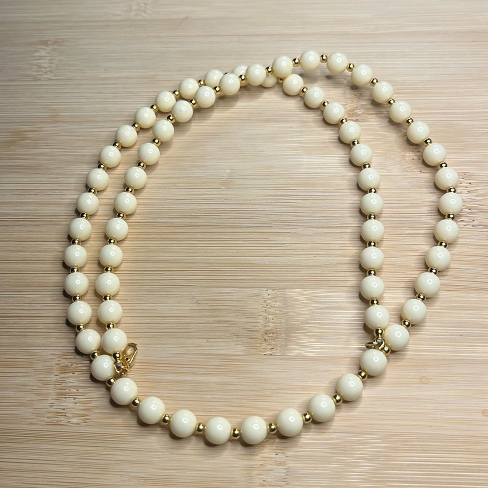Vintage Monet cream and gold bead necklace, 27” plastic beads, 1980s